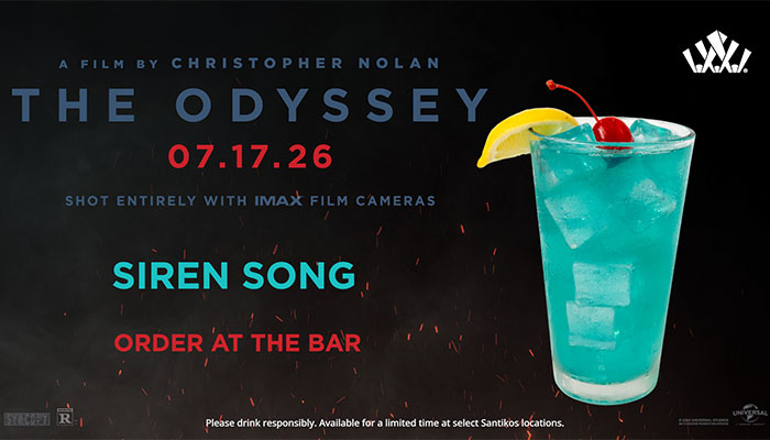 The Odyssey Siren Song blue cocktail with lemon and cherry garnish